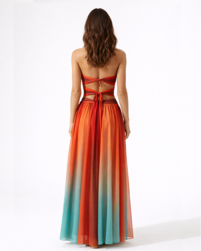 Robe longue bustier drapée avec découpes taille et jupe fluide