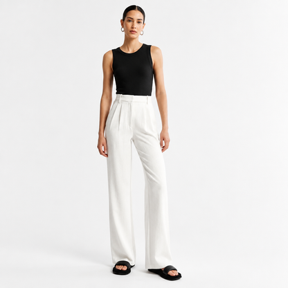 Pantalon large taille haute femme en blanc, vue de face avec pli central net et tombé droit