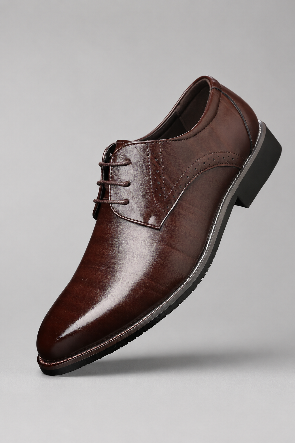 Chaussures de ville homme en cuir marron, vue de profil