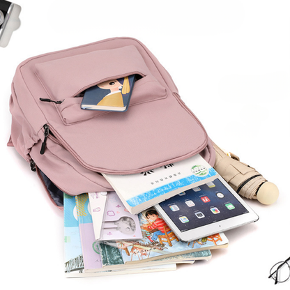 Sac à dos scolaire en polyester, détail de la poignée de transport, coloris bleu