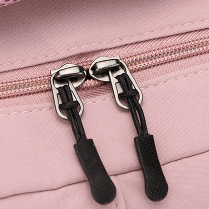 Sac à dos scolaire en polyester, détail du tissu déperlant, coloris blanc
