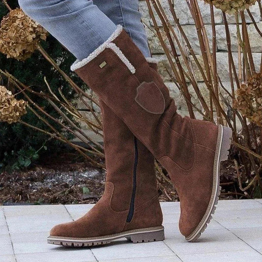 Bottes hautes pour dames avec fermeture éclair et semelle profilée