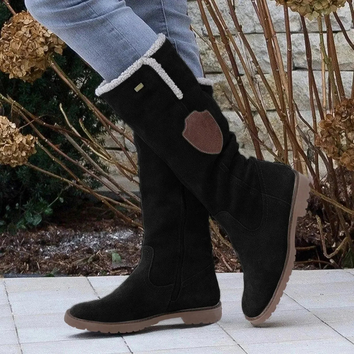 Bottes hautes pour dames avec fermeture éclair et semelle profilée