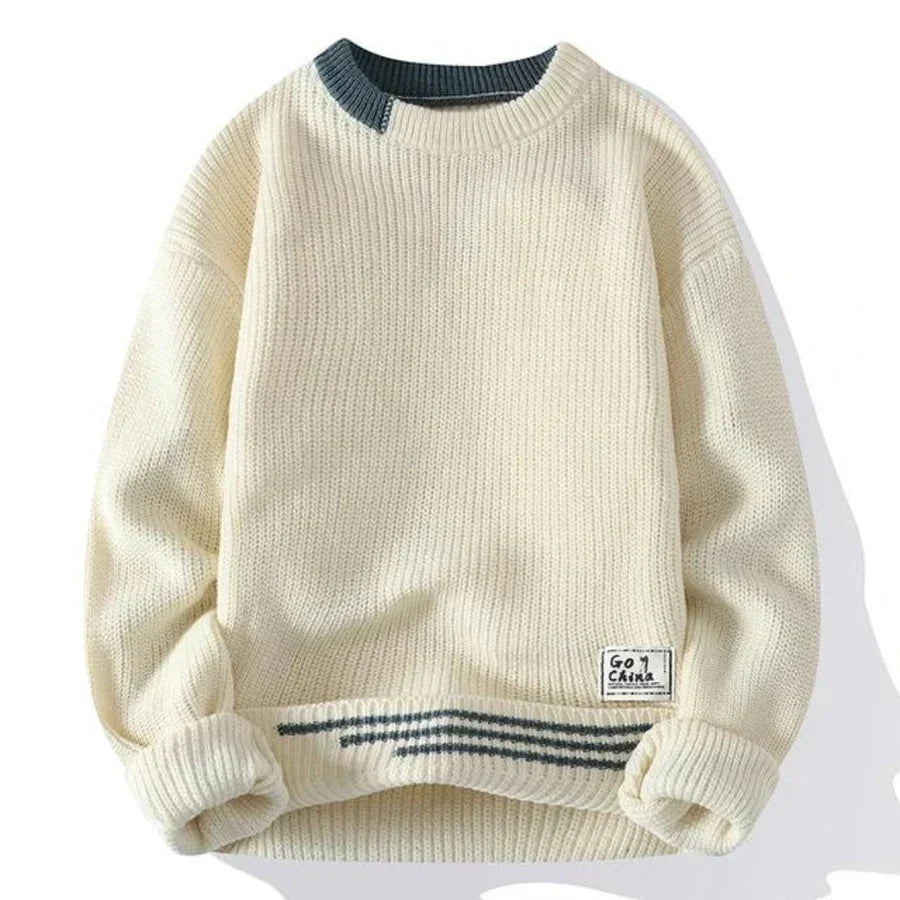 Pull décontracté homme avec poignets côtelés, vue de profil