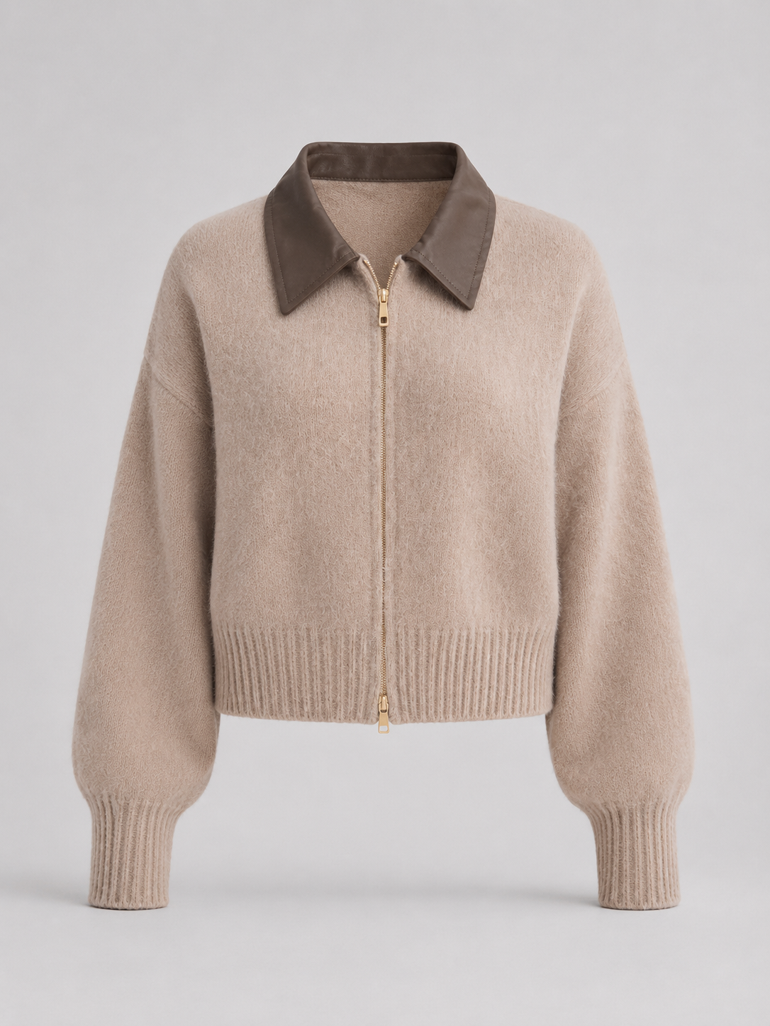 gilet en maille à zip pour femme, porté avec un jean