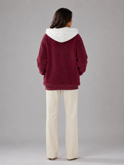 Veste matelassée pour femme à capuchon sherpa, détail de la manche