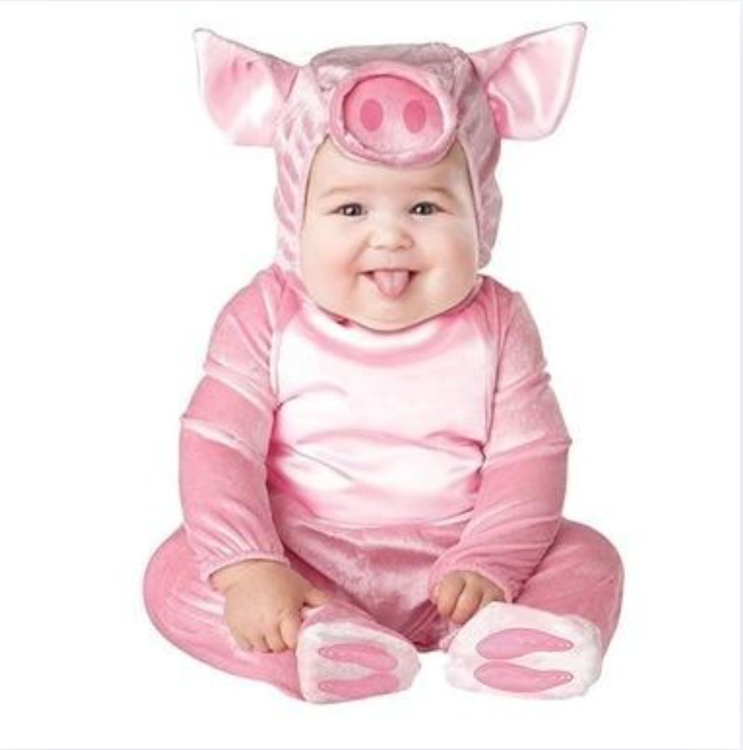 Bébé portant un déguisement de cochon