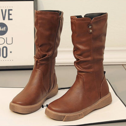 bottes mi-mollet noires avec fermeture éclair, vue de profil