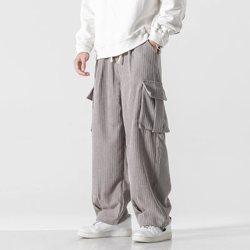 Pantalon de survêtement cargo en velours côtelé gris, coupe ample à taille élastique et cordon de serrage