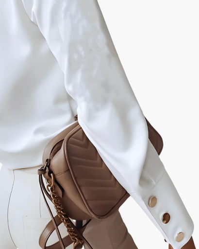 Top femme à boutons asymétriques et poignets larges