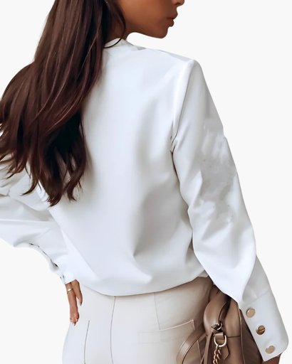 Top femme à boutons asymétriques et poignets larges