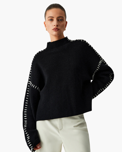 Pull femme à col montant avec détails contrastés