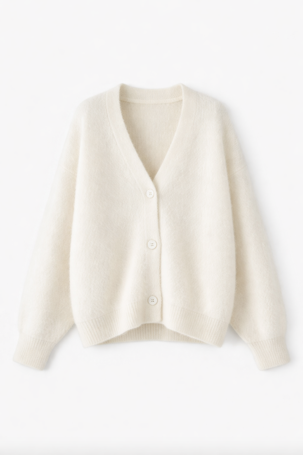 Détail de la maille douce et moelleuse du cardigan oversize