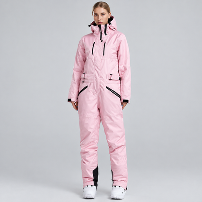 Combinaison de neige unisexe rose à capuche, vue de face, portée par un modèle
