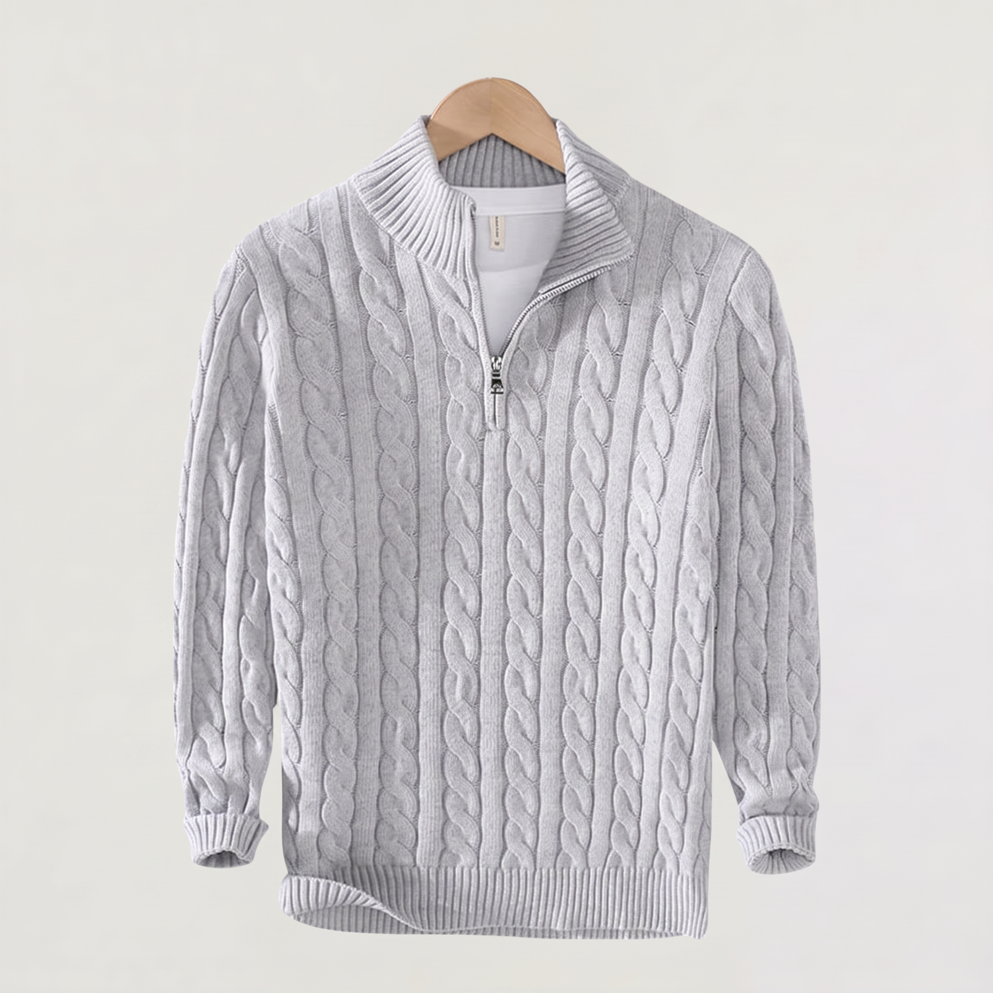 Pull tricoté demi-zip marine, détail poignets côtelés