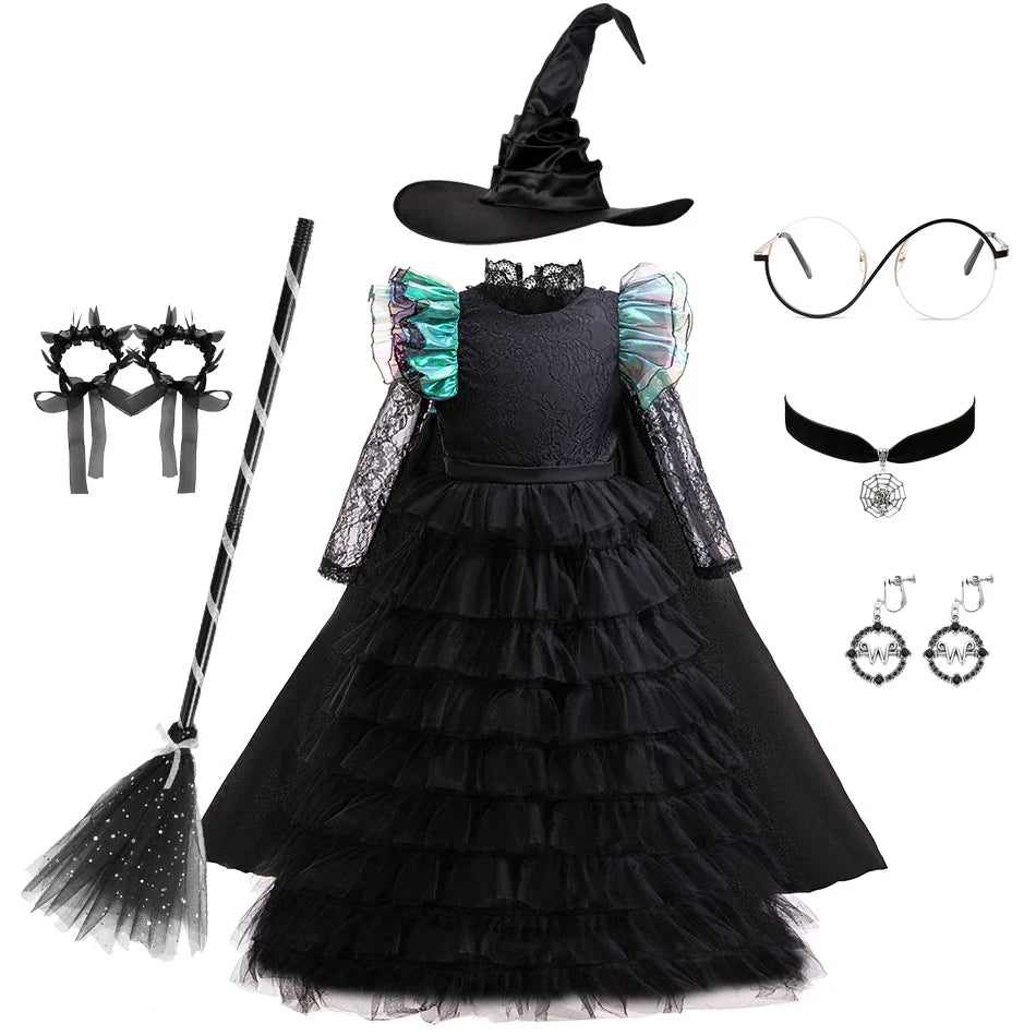Robe de sorcière émeraude avec chapeau, balai, lunettes et bijoux en bonus