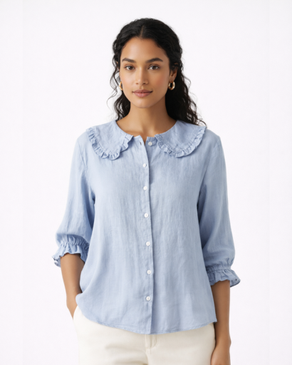 Chemisier femme col rond à volants boutonné