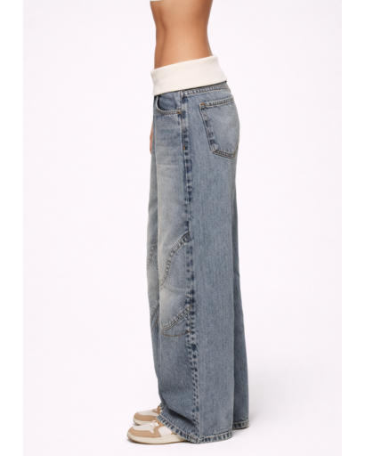 Jean large taille basse avec empiècements et poches arrière