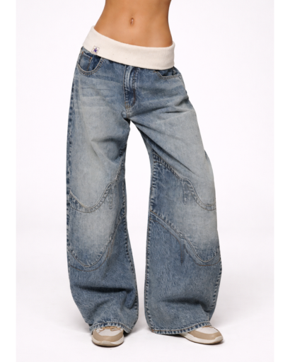 Jean large taille basse avec empiècements et poches arrière