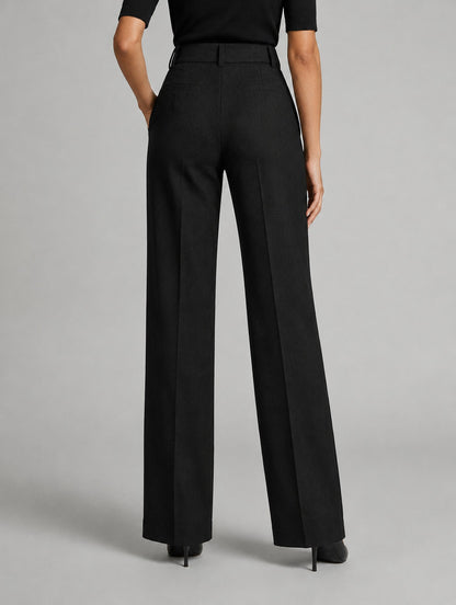 Pantalon large taille haute à plis pour femme, coloris gris foncé, porté par une femme, vue de dos