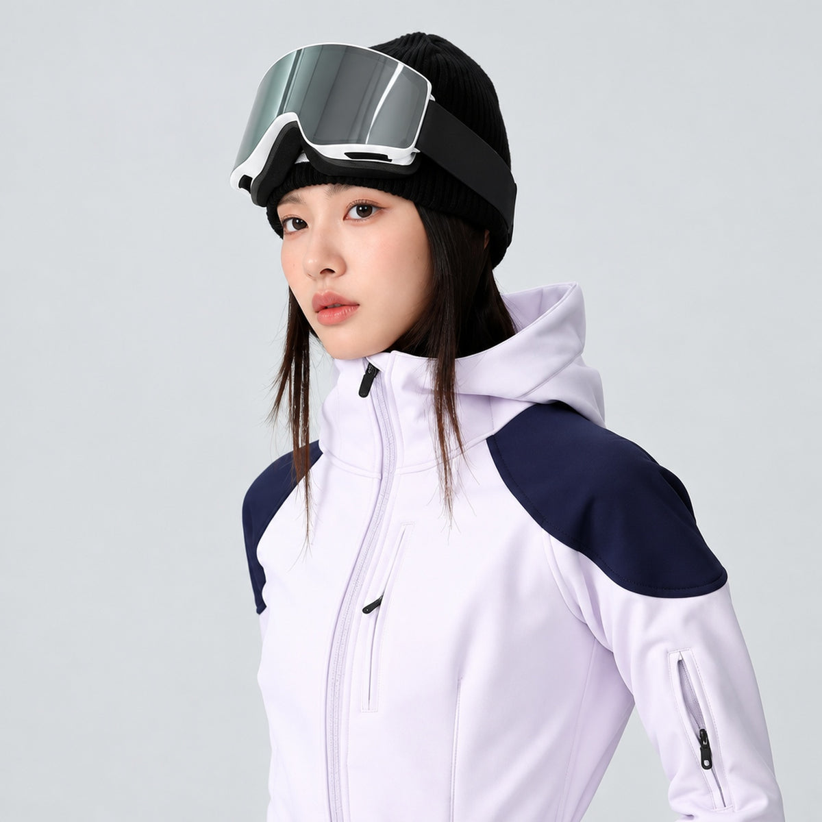 Combinaison de ski femme lilas pâle, détail capuche et col zippé