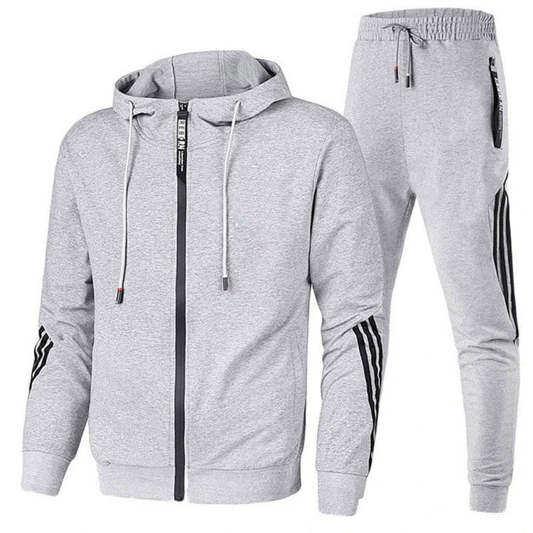 Ensemble jogging homme gris à capuche, veste zippée et pantalon bandes contrastées, vue face