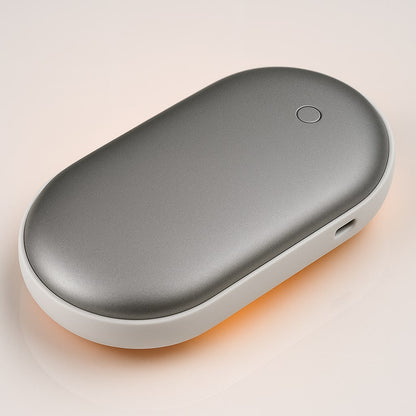 Chauffe-mains électrique coloris argenté avec batterie externe