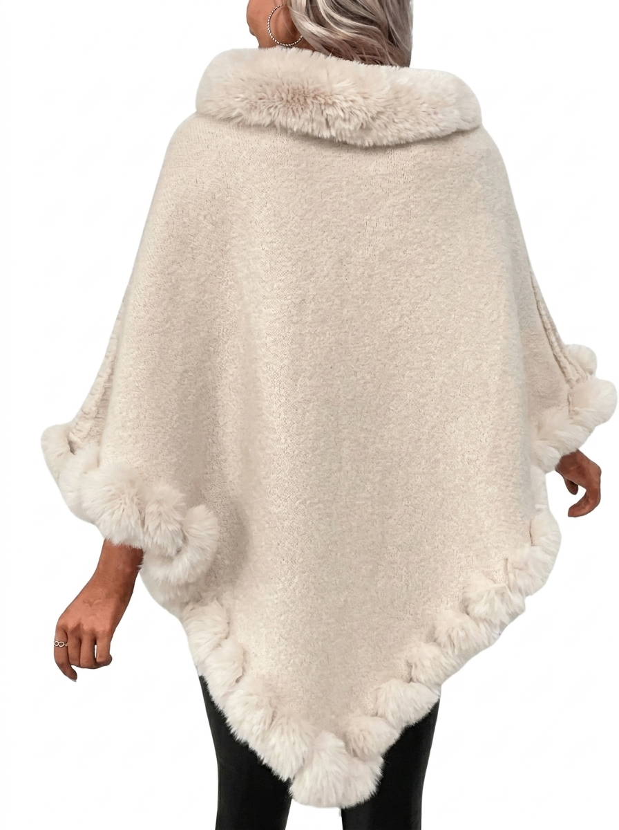 Poncho en maille oversize avec bordure en fausse fourrure, porté
