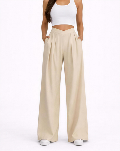 Pantalon palazzo femme beige, taille haute et jambes larges plissées, vue face