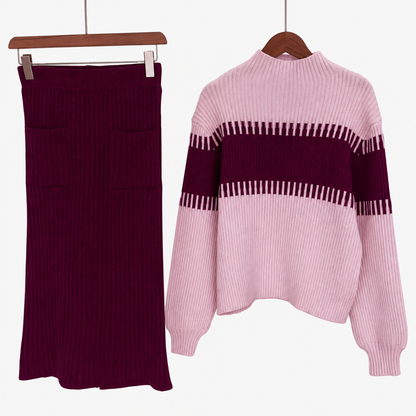 Ensemble femme jupe côtelée et pull col montant rose foncé, présentation à plat sur cintre
