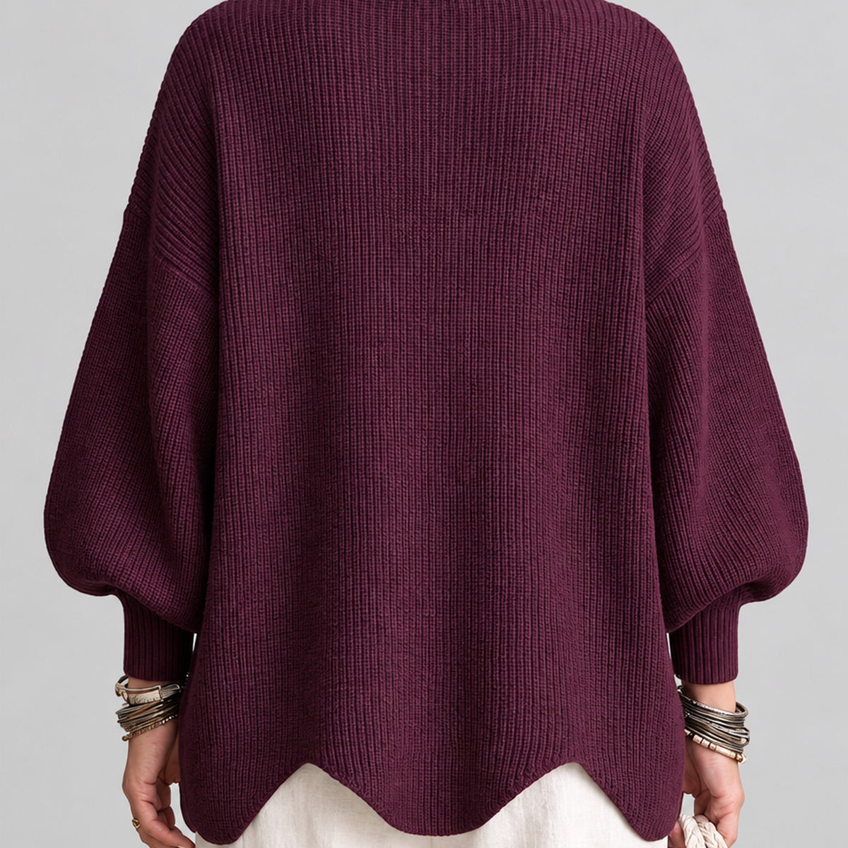 Veste femme à fermeture asymétrique, détail des manches ballon