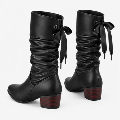 Bottines mi-mollet froncées noires, vue arrière du laçage et du talon bicolore