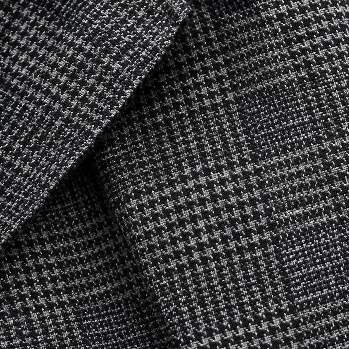 Détail de la texture du tissu en polyester façon tweed