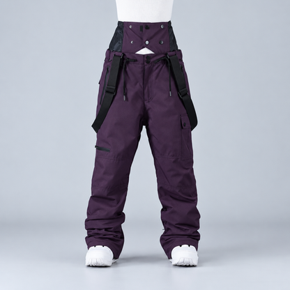 Pantalon de snowboard unisexe violet, vue de profil montrant les bretelles et les poches cargo