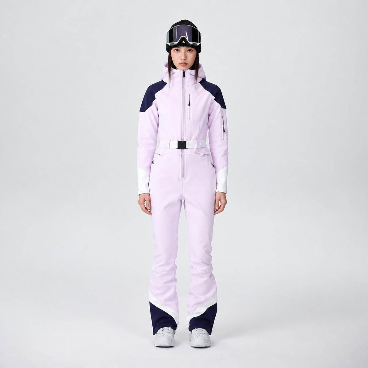 Combinaison de ski femme rose pâle, vue de face portée par un mannequin