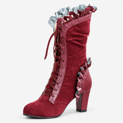 Bottines steampunk rouges en daim, laçage avant et talon, vue studio