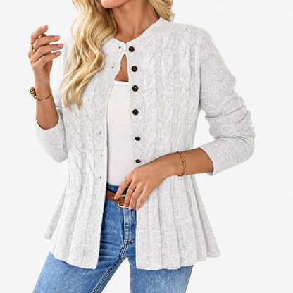 Cardigan féminin blanc à peplum ajusté, vue de face en studio